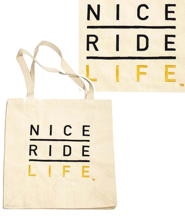 La Jolla tote featuring NICERIDE LIFE design on cotton canvas with square bottom gusset and long webbed handles.