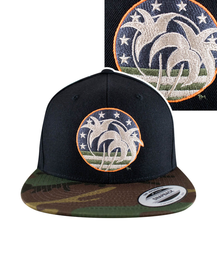 Spirit of 76 hat featuring embroidered design on the front and camouflage brim on a flatbill snapback style.