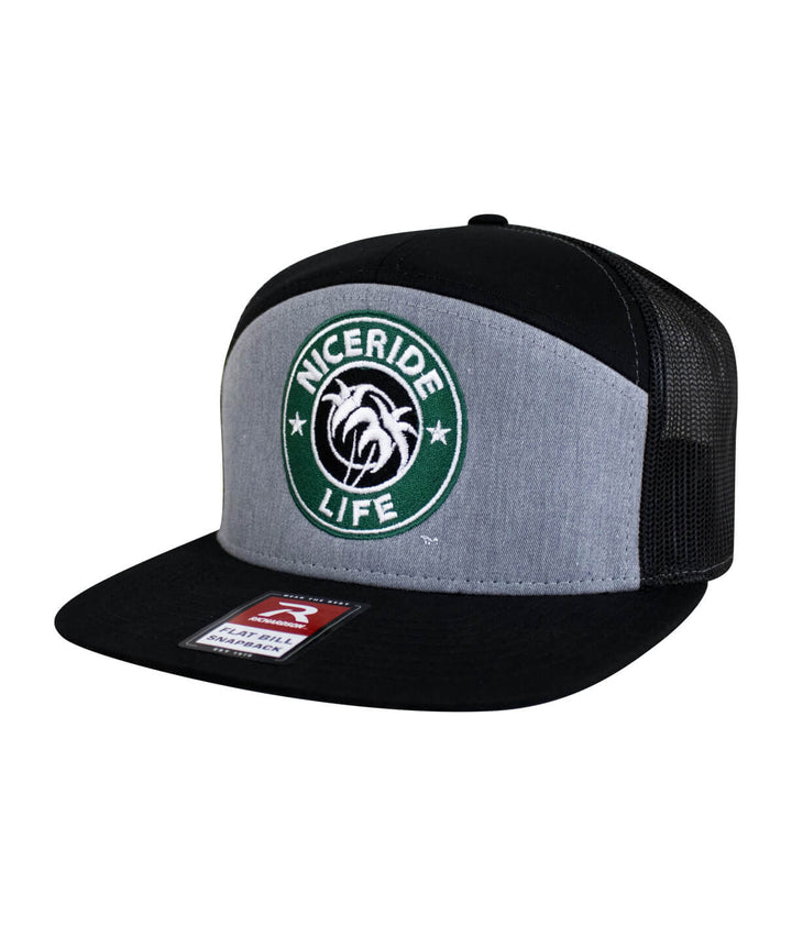 NICERIDE Stopper 7-Panel Trucker Hat featuring embroidered logo and mesh back for outdoor style and comfort.