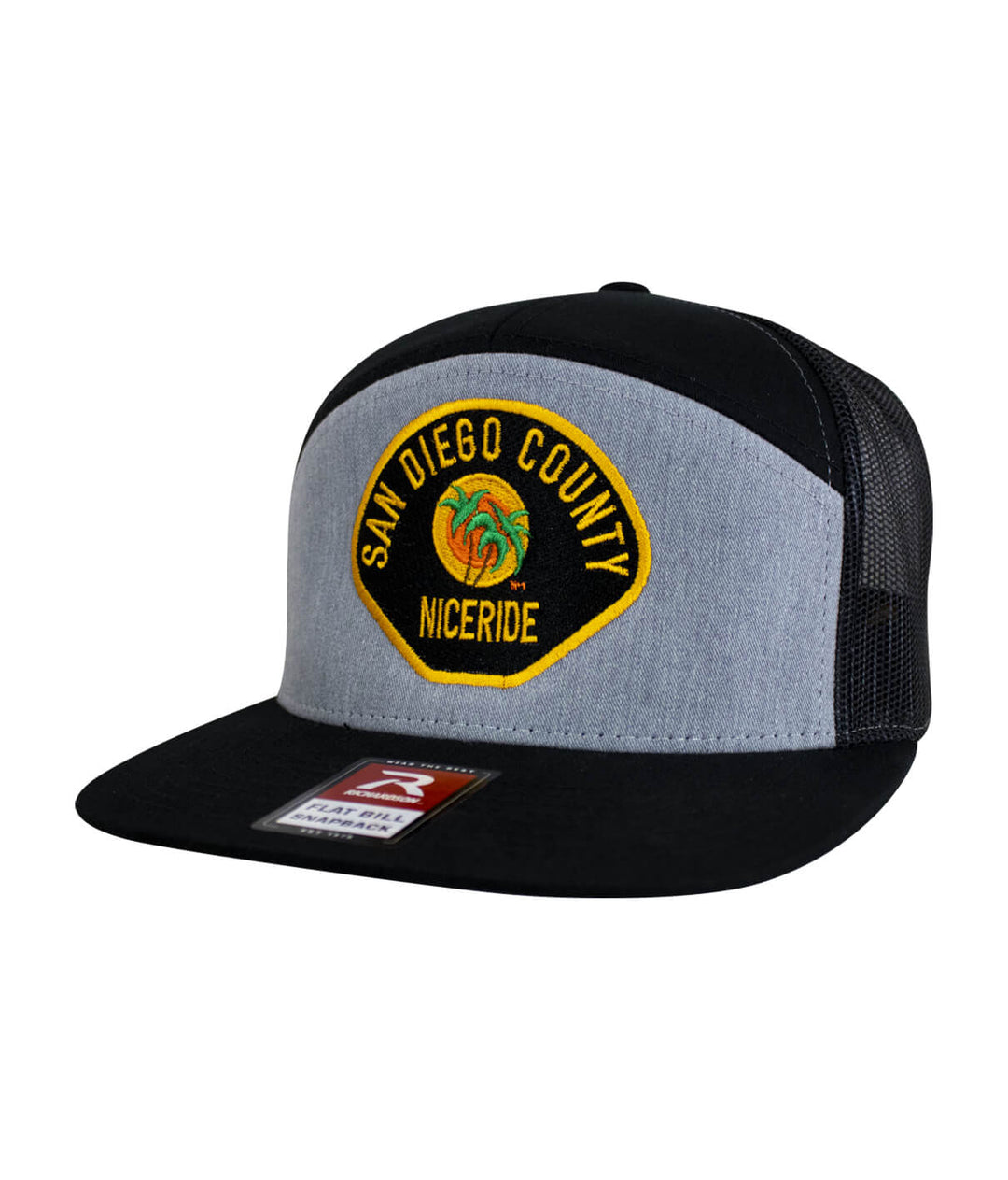 The Badge 7 Panel Trucker Hat, embroidered design, adjustable baseball cap from NICERIDE.