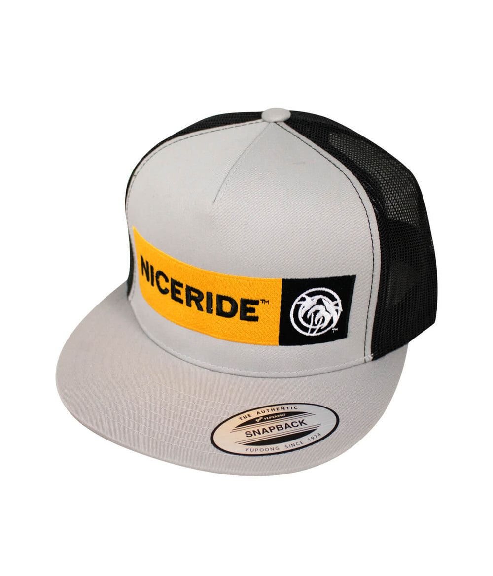Dozer trucker hat by NICERIDE featuring classic snapback design in grey and black with embroidered details.