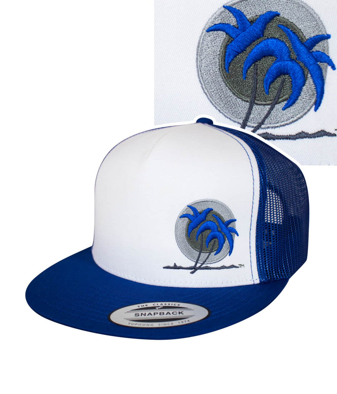 Bold Palm Trucker Hat featuring blacked out palm logo with blue and red leaves, designed and embroidered in the USA.