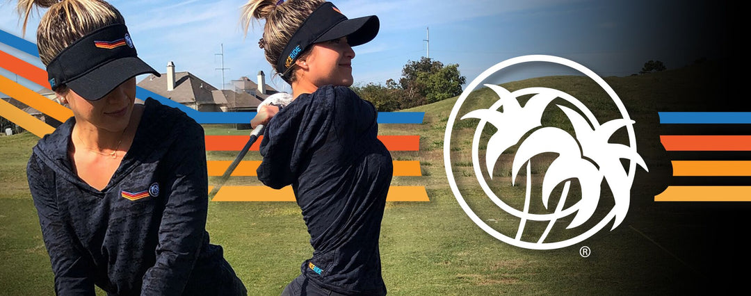 Woman wearing a black Aquarius visor, showcasing style while golfing on a sunny day.